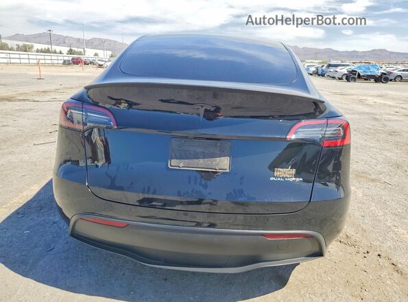 7SAYGAEE3RF991107 2024 TESLA MODEL Black Rear view