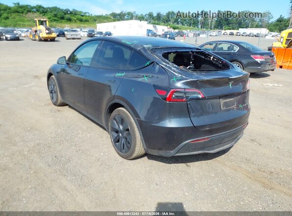 7SAYGAEE4RF108681 2024 TESLA MODEL Y Gray Tył lewy