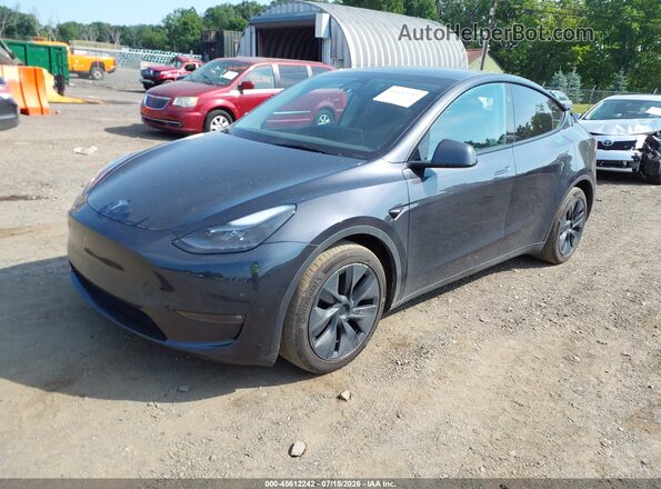 7SAYGAEE4RF108681 2024 TESLA MODEL Y Gray Przód lewy