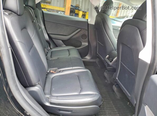 7SAYGAEE5NF541372 2022 TESLA MODEL Black Rear seats view