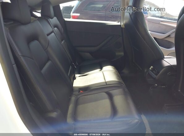 7SAYGAEE5PF629549 2023 TESLA MODEL Y White VIN კოდის სტიკერის ხედი