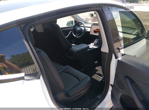 7SAYGAEE5PF703083 2023 TESLA MODEL Y White VIN կոդի պիտակի տեսք
