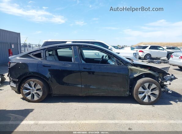 7SAYGAEE6PF767147 2023 TESLA MODEL Y Black უკანა სალონის ხედი