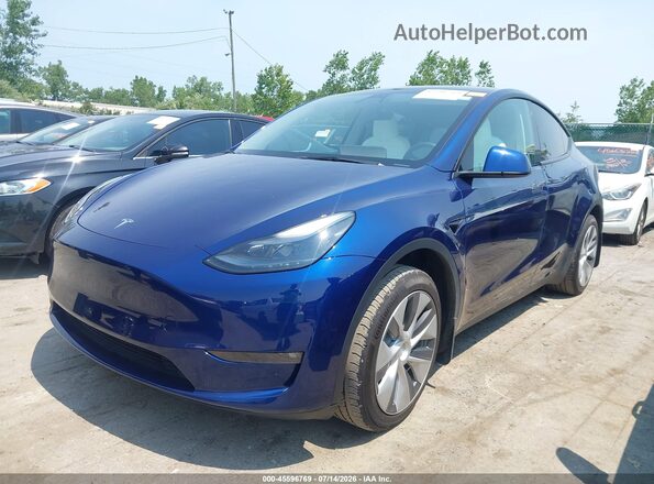 7SAYGAEE6PF779816 2023 TESLA MODEL Y Blue Front left