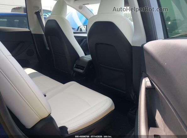 7SAYGAEE6PF779816 2023 TESLA MODEL Y Blue VIN sticker view