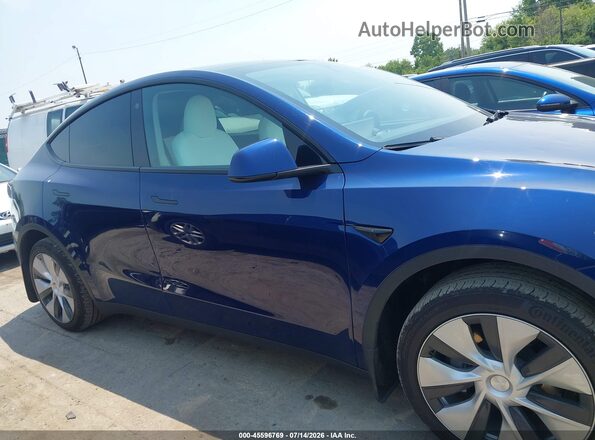 7SAYGAEE6PF779816 2023 TESLA MODEL Y Blue Rear interior view