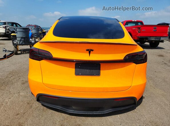 7SAYGAEE6RF029884 2024 TESLA MODEL Two Tone Rear view