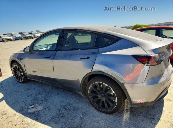 7SAYGAEE6SF219870 2025 TESLA MODEL Gray Trasero izquierdo
