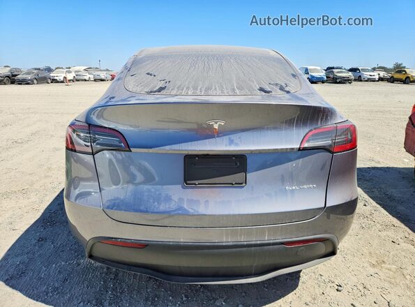 7SAYGAEE6SF219870 2025 TESLA MODEL Gray Vista trasera