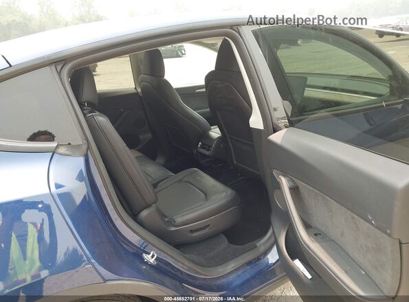 7SAYGAEE7RF111297 2024 TESLA MODEL Y Blue Vista de la etiqueta del VIN