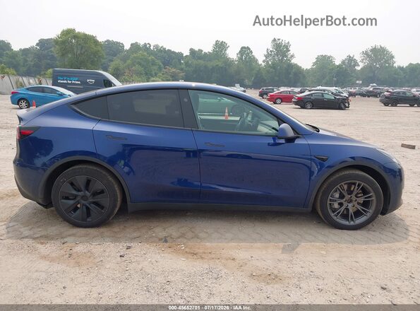 7SAYGAEE7RF111297 2024 TESLA MODEL Y Blue Vista interior trasera