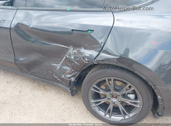 7SAYGAEE7RF200674 2024 TESLA MODEL Y Gray Vista frontal