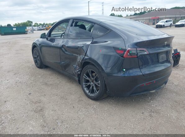 7SAYGAEE7RF200674 2024 TESLA MODEL Y Gray Trasero izquierdo