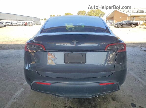 7SAYGAEE8RF100115 2024 TESLA MODEL Charcoal Հետևի տեսք