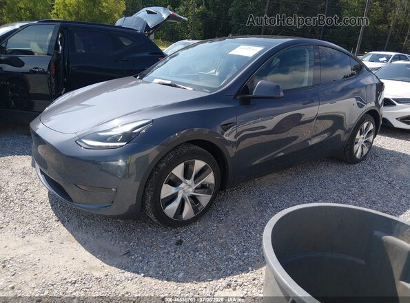 7SAYGAEE9PF788283 2023 TESLA MODEL Y Gray Front left