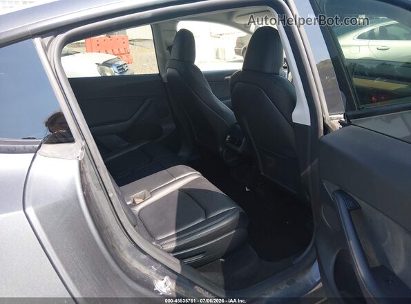 7SAYGAEE9PF788283 2023 TESLA MODEL Y Gray Rear seats view