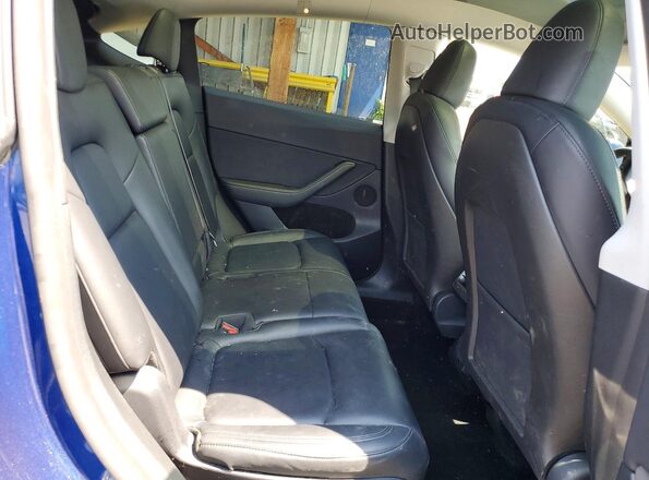 7SAYGAEE9RF193887 2024 TESLA MODEL Blue უკანა სავარძლების ხედი