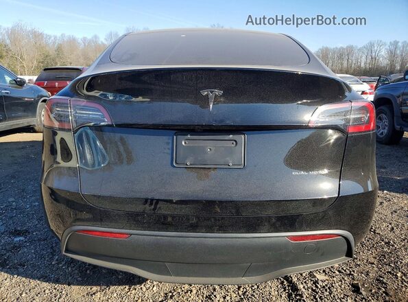 7SAYGAEE9RF207206 2024 TESLA MODEL Black Widok z tyłu