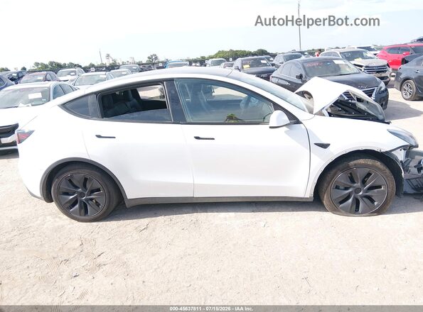 7SAYGAEE9SF256864 2025 TESLA MODEL Y Белый Вид панели приборов