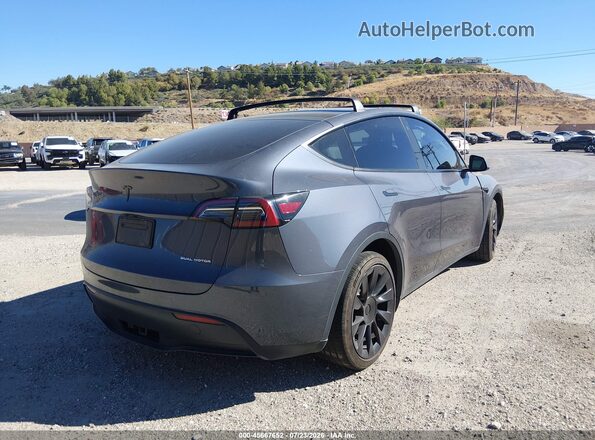 7SAYGAEEXPF620474 2023 TESLA MODEL Y Gray Rear right
