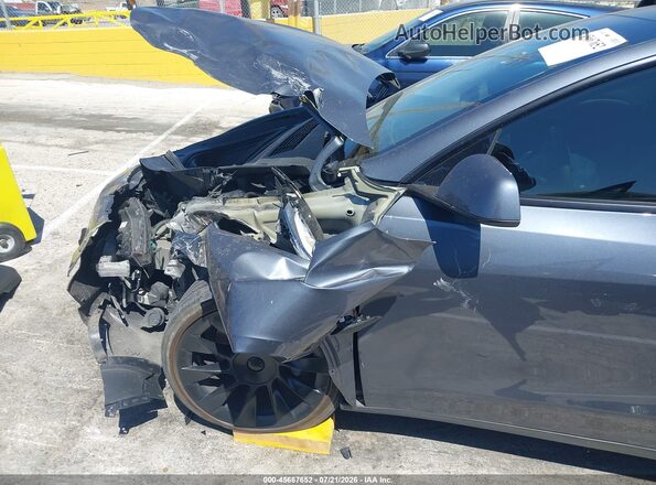 7SAYGAEEXPF620474 2023 TESLA MODEL Y Gray Rear interior view