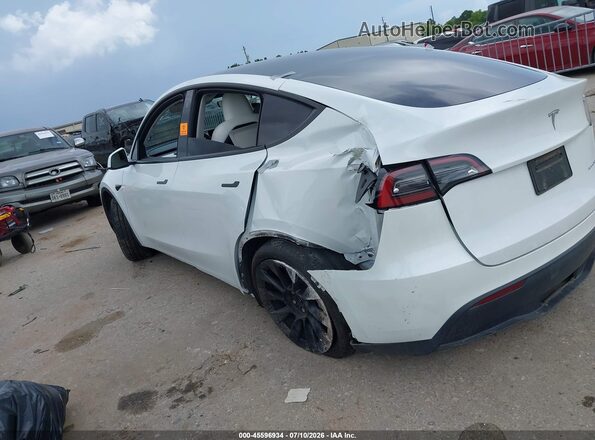 7SAYGAEEXPF751520 2023 TESLA MODEL Y White Rear left