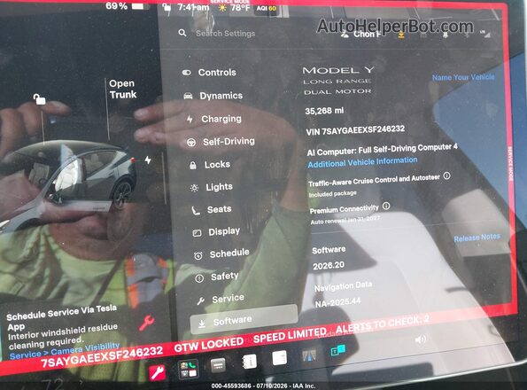 7SAYGAEEXSF246232 2025 TESLA MODEL Y Gray Widok tylnych siedzeń