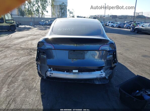7SAYGAEEXSF246232 2025 TESLA MODEL Y Gray 