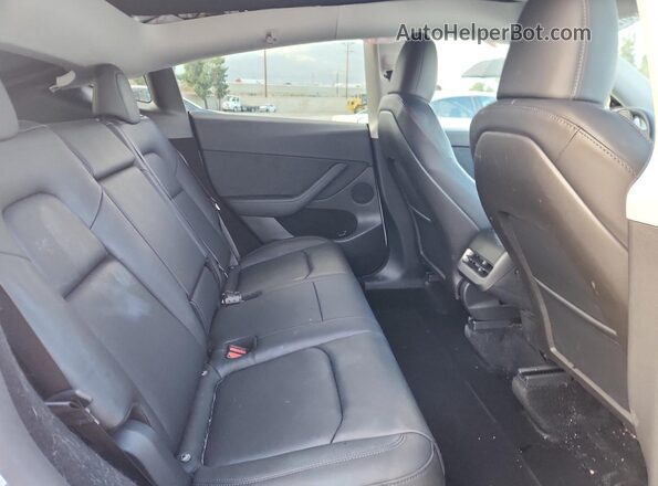 7SAYGDED0RF055390 2024 TESLA MODEL White Rear seats view