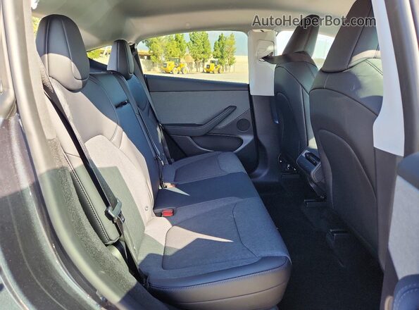 7SAYGDED0TA603277 2026 TESLA MODEL Gray Rear interior view