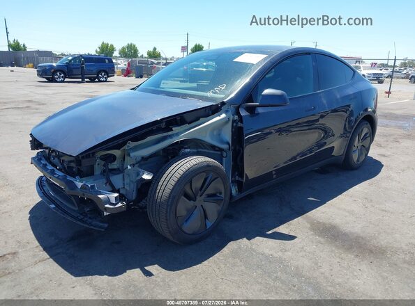 7SAYGDED0TF583762 2026 TESLA MODEL Y Black Vista tres cuartos delantera izquierda