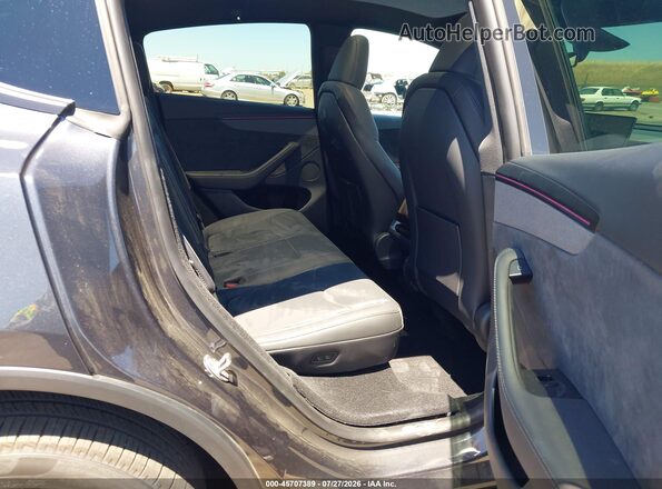 7SAYGDED0TF583762 2026 TESLA MODEL Y Black Vista de la etiqueta del VIN