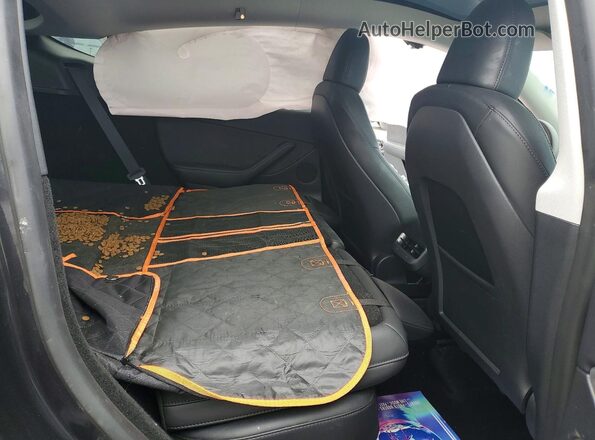 7SAYGDED1RF008207 2024 TESLA MODEL Gray Rear interior view