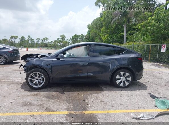 7SAYGDED1RF016663 2024 TESLA MODEL Y Black Vista interior trasera