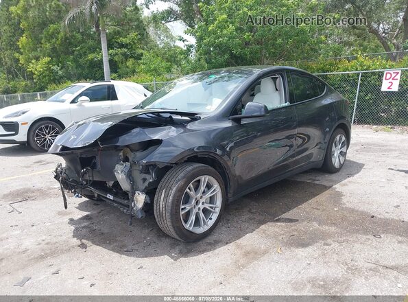 7SAYGDED1RF016663 2024 TESLA MODEL Y Black Vista tres cuartos delantera izquierda