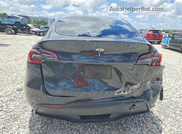 7SAYGDED1RF034256 2024 TESLA MODEL Black Вид ззаду
