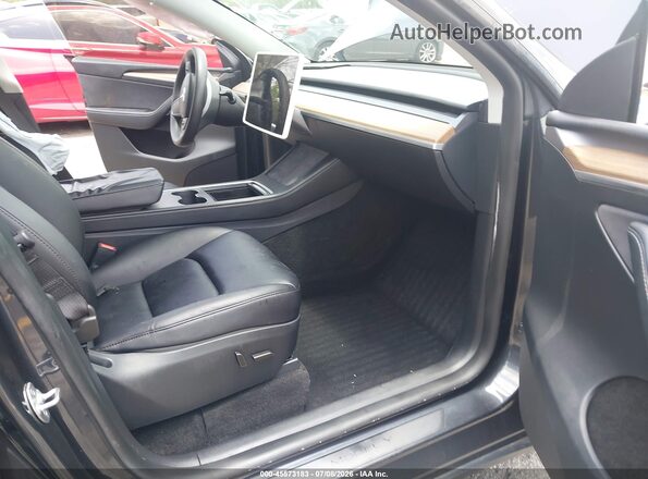 7SAYGDED1RF038517 2024 TESLA MODEL Y Серый Вид салона спереди