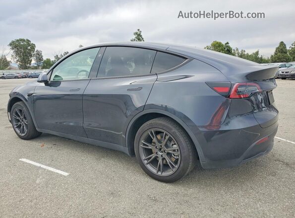 7SAYGDED1SF278317 2025 TESLA MODEL Gray Trasero izquierdo