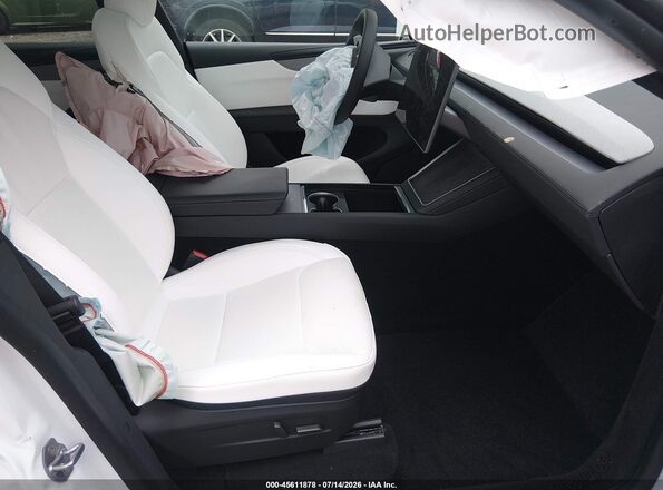 7SAYGDED1TF626280 2026 TESLA MODEL Y White Widok wnętrza z przodu