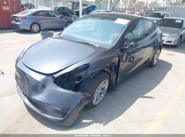 7SAYGDED2RF050630 2024 TESLA MODEL Y Gray Առջևի ձախ երեք քառորդ տեսարան