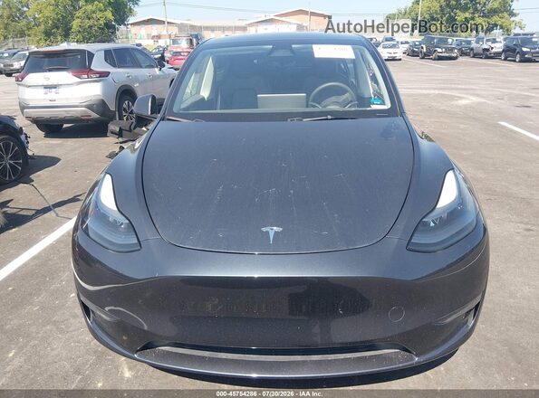 7SAYGDED2RF091906 2024 TESLA MODEL Y Серый Вид задней части салона