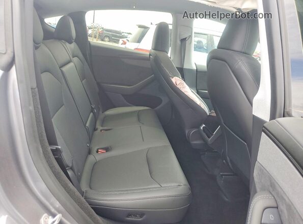 7SAYGDED2TF525166 2026 TESLA MODEL Charcoal Rear seats view
