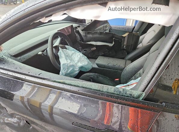 7SAYGDED2TF643475 2026 TESLA MODEL Charcoal Vista interior delantera