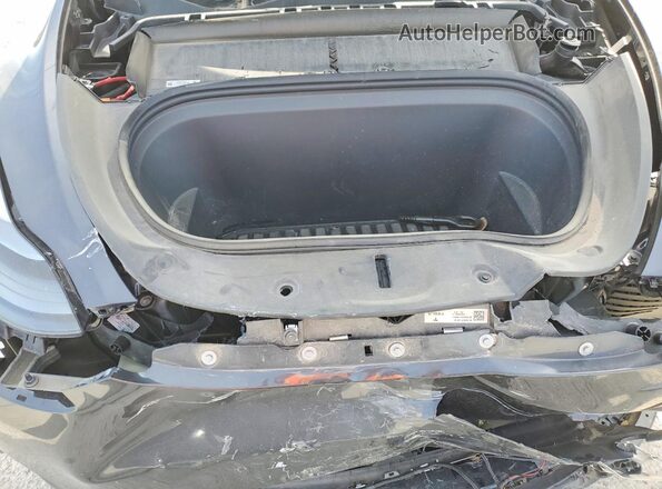 7SAYGDED3RF113850 2024 TESLA MODEL Charcoal Rear interior view