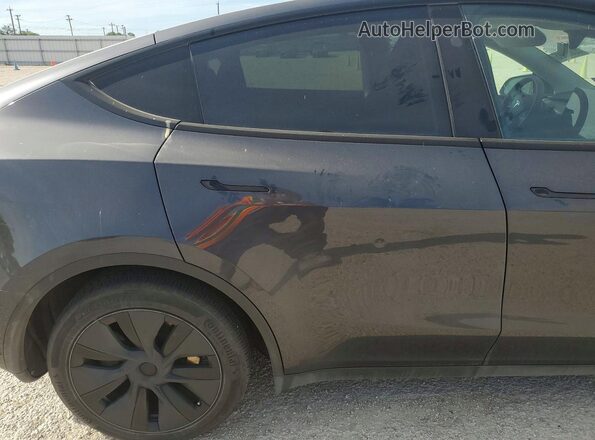 7SAYGDED3RF113850 2024 TESLA MODEL Charcoal Rear seats view