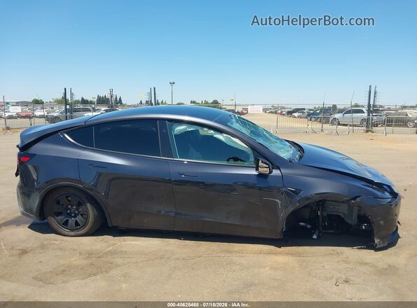 7SAYGDED3TA601653 2026 TESLA MODEL Y Серый Вид панели приборов