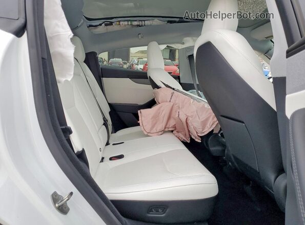 7SAYGDED3TF439297 2026 TESLA MODEL White Rear interior view