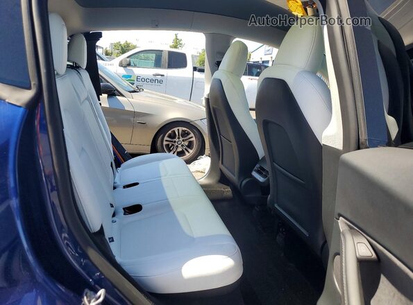 7SAYGDED4SF278781 2025 TESLA MODEL Blue Вид задньої частини салону