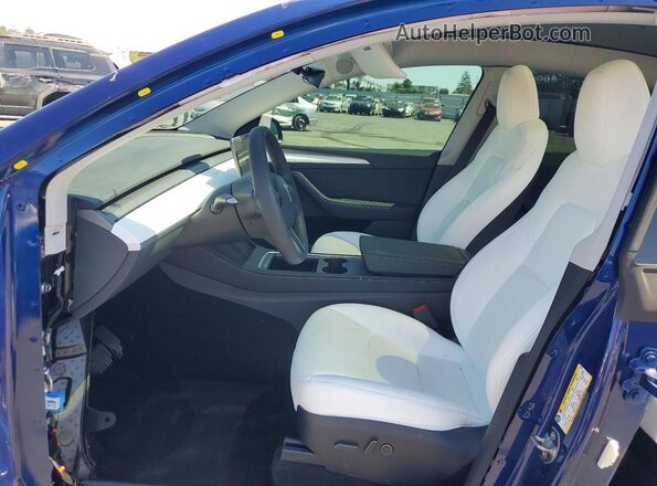 7SAYGDED4SF278781 2025 TESLA MODEL Blue Вид салону спереду