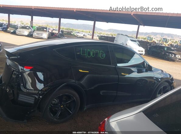 7SAYGDED4TA417709 2026 TESLA MODEL Y Black Instrument cluster view